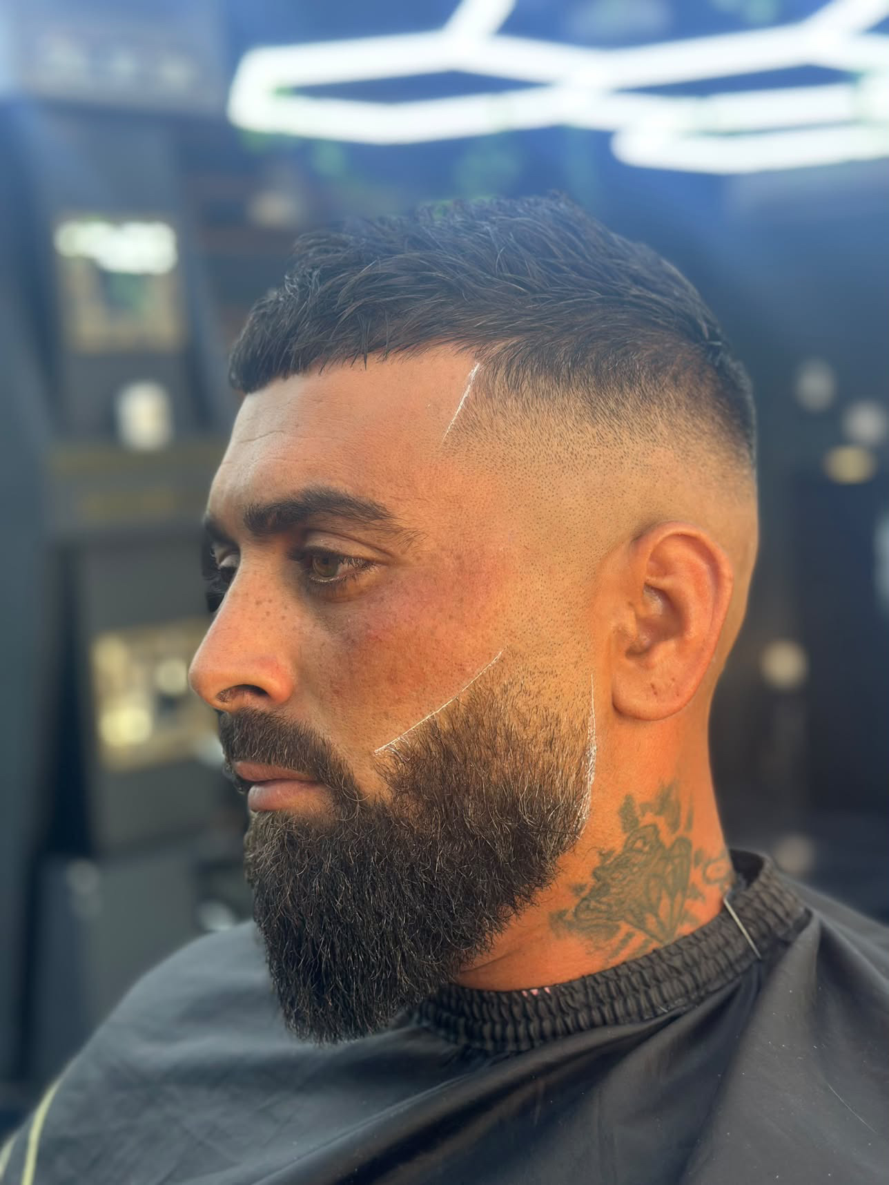 Beard trim and fade with crisp detailing by Kritikos Barbershop
